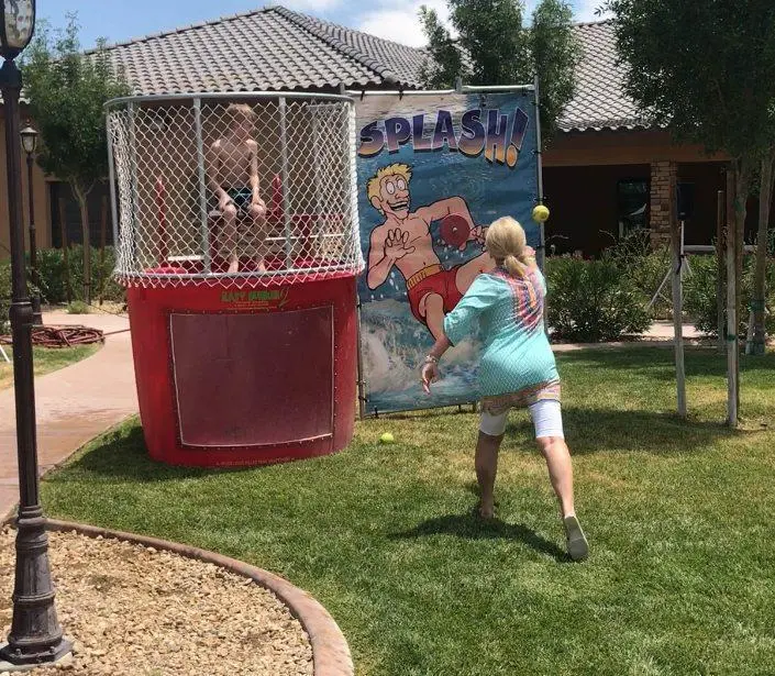 Dunk Tank Splash Game Woman Throwing Ball Outdoor Event Production Las Vegas