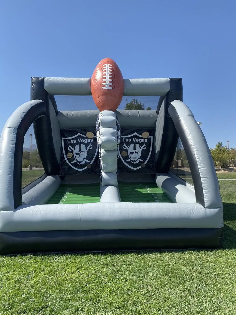Raiders Football Toss Game Inflatable Attraction for Event Production in Las Vegas