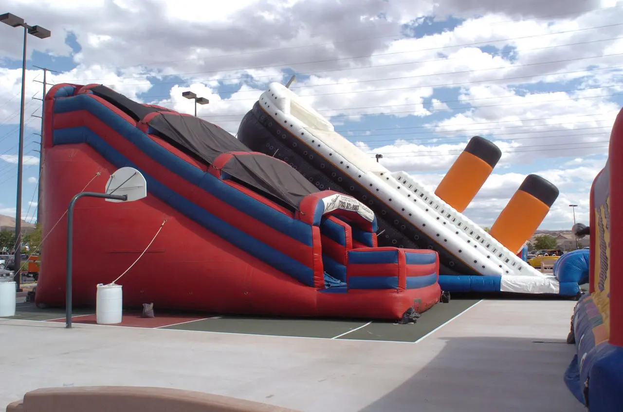 Titanic Themed Inflatable Slide Basketball Hoop Outdoor Event Production Las Vegas
