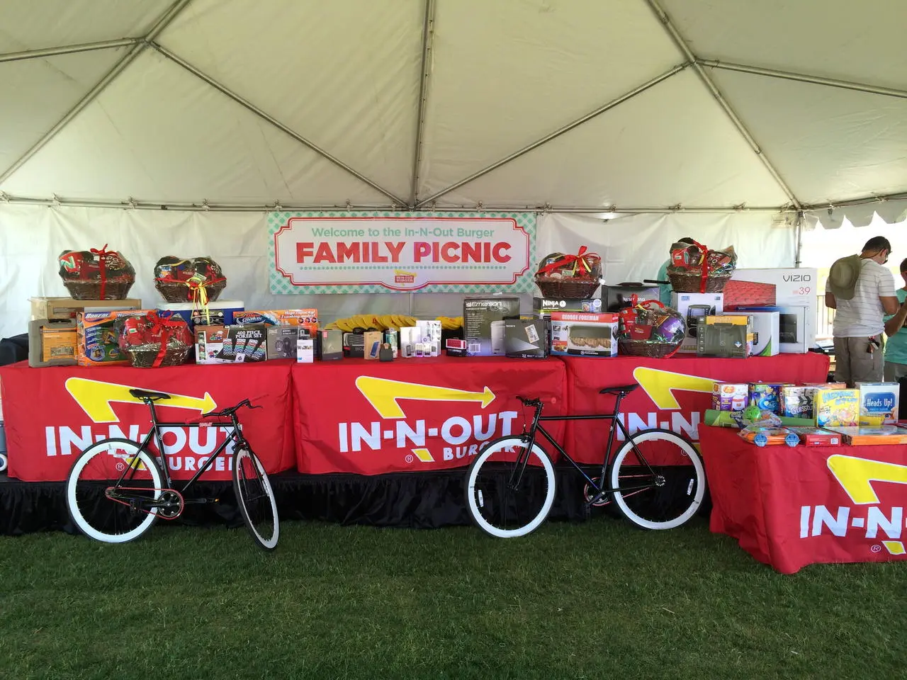 In-N-Out Burger family picnic prize display with bicycles and gift baskets in Las Vegas