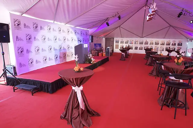 Smith Center formal event with red carpet, stage, and podium in tent in Las Vegas